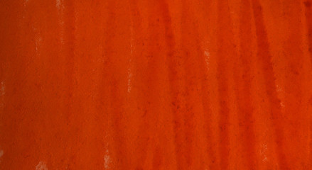 A saturated dark red watercolor  abstract background, spot, splash of paint, blot, divorce. Vintage pattern for different design and decoration. With space for text.