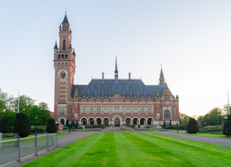 green grass lane in front of palace of peace in The Hague, Netherlands