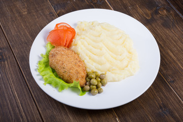 Mashed potatoes with fried meat cutlet