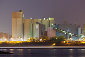 Fototapeta na wymiar Cement Factory At Night