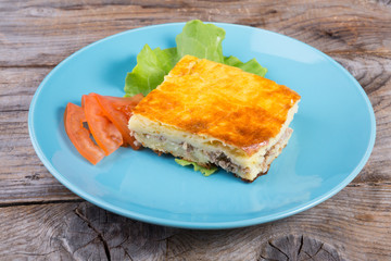 Portion of casserole