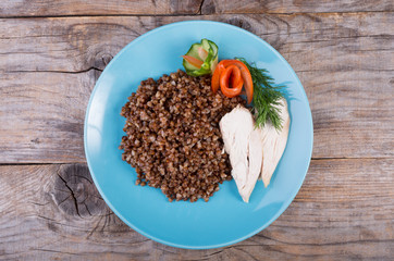Buckwheat porridge served with steamed chicken