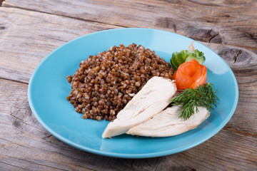 Buckwheat porridge served with steamed chicken
