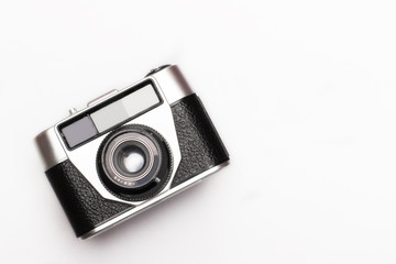 Vintage old photo camera on white background from top