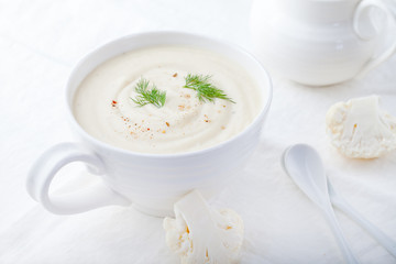 Cauliflower soup on a white background. Healthy food.