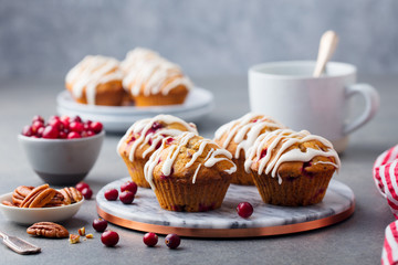Muffins, cakes with cranberry and pecan nuts. Christmas decoration.
