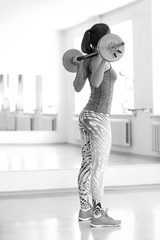 Young attractive woman doing workout