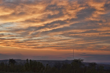 Dramatic sky at sunset over the mountain Karachun