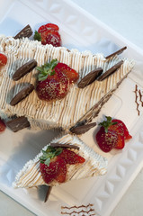 chocolate cake with stuffing and strawberries