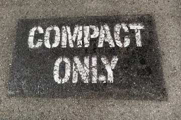 Fototapeta premium Parking lot COMPACT ONLY parking space.