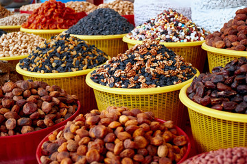 Counter with nuts and dried fruits on the market in Central Asia