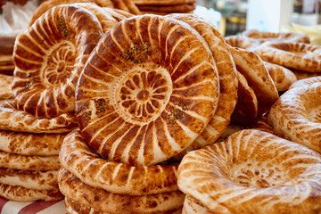 National uzbek bread sold in the market - Samarkand, Uzbekistan