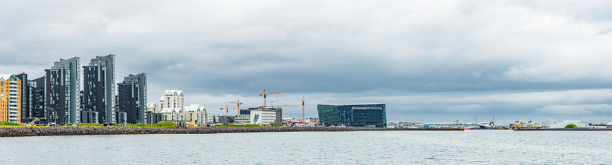 Naklejka premium Beautiful panoramic view of modern Reykjavik at evening, Iceland