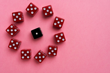 Red gaming dices on pink background. Flat lay, place for text. Game concept