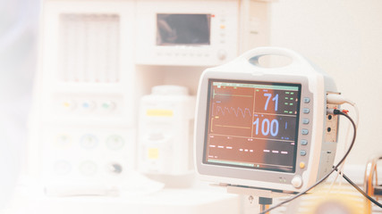 Heart monitor measuring vital signs. heart rate monitor in hospital theater