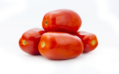 So-called elongated tomato, cut into a slice, isolated on a white background