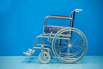 wheelchair isolated on Blue background