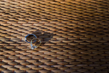 couple ring on wood background