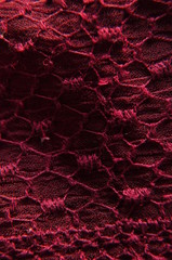 Obraz premium macro avec détail de broderie bordeau ton sur ton