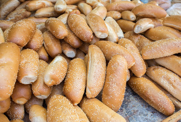 Fresh bread rolls in a box at the city market