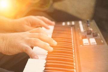 keyboard player in the sun