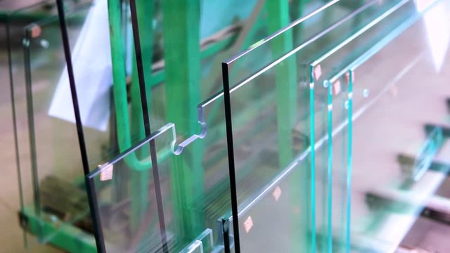 Sheets of Factory manufacturing tempered clear float glass panels cut to size