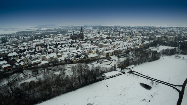 the city of Friedberg in Germany in the winter. Winter park with ice rink