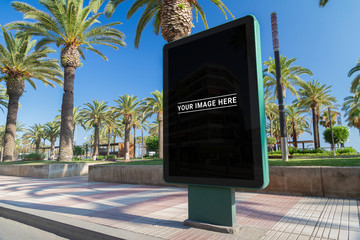 Outdoor billboard advertisement in seaside resort city mockup