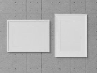 White rectangular frames hanging on a concrete wall mockup 3D rendering