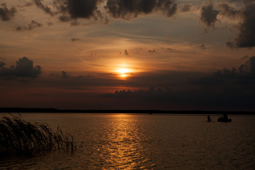 Beautiful summer sunset in the lake Svityaz. Sunset Background