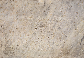 Antique natural marble background. Scratched and weathered texture.