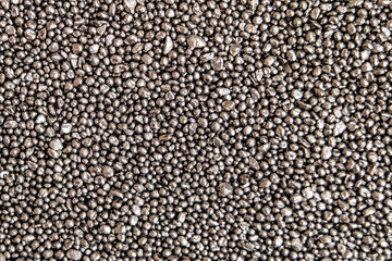 Steel shot for blasting machine. Abstract background of small metal balls.