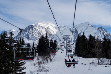 Fototapeta premium Ski chair lifts in action in Chamonix, France