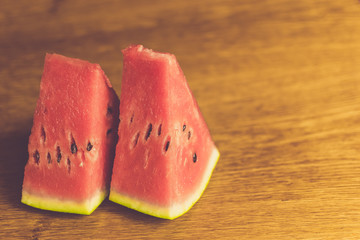 big piece of watermelon on wooden background. rustic style