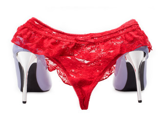 High heels and red panties.