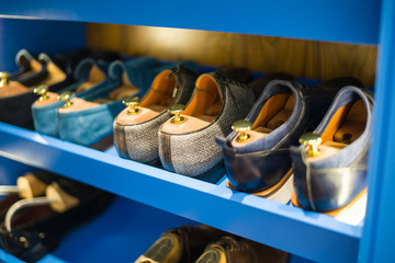 showcase with shoes in the store