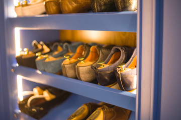 showcase with shoes in the store, showcase with shoes in the studio, wardrobe