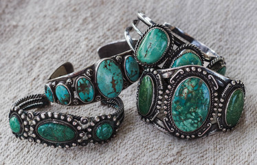 Four antique Navajo silver and turquoise bracelets