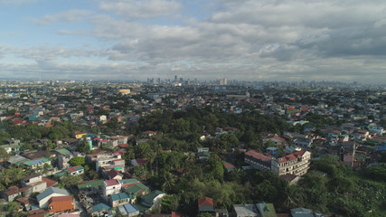 Aerial view of Manila city with skyscrapers and buildings. Philippines, Luzon. Aerial skyline of Manila.