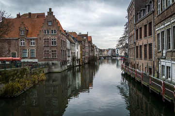 Fototapeta na wymiar Brugge, West Flanders Belgium - January 2017: canals and old medieval houses, winter cityscape