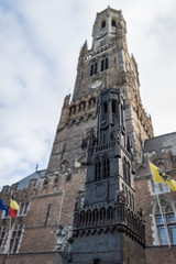 The Belfry of Bruges, a medieval bell tower, view from below with a miniature model of it, West Flanders, Belgium