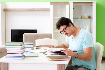 Student preparing for university exams at home