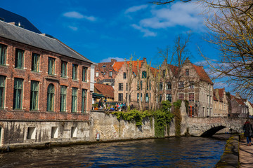 Fototapeta na wymiar Canals of the historical and beautiful Bruges town in Belgium