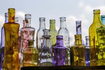 Obraz na płótnie Canvas colorful glass bottles