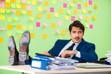 Businessman having trouble with his priorities