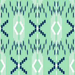 Fototapeta na wymiar Ikat Seamless Pattern Design. Ethnic fabric. Bohemian fashion