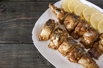 Marinated mackerel slices baked on the grill