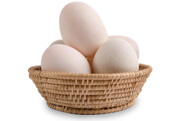 Eggs in the basket Isolated on White Background