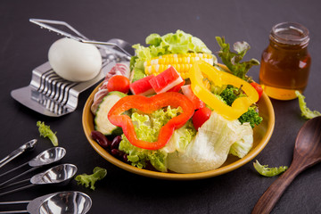 close up,.Salad healthy food on black stone background. .Weight loss.