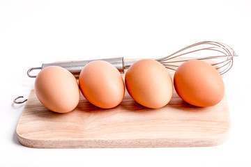 Eggs on a butcher with white background
